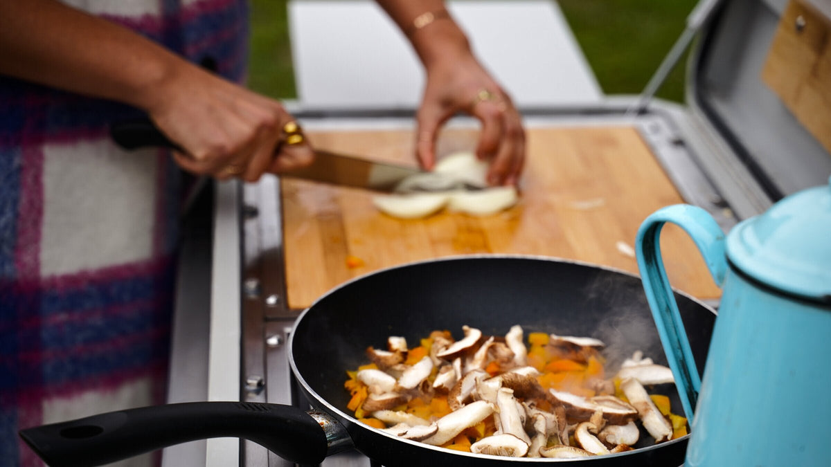 HitchFire Camp Kitchen set up and cooking outdoors